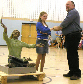 Emily and Dave with statue