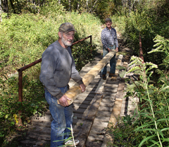 Bridge repair: Ray Dart (front) and Corky Hull (rear)